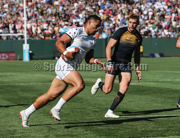 2018RugbySevensSun-19.JPG - United States player Martin Losefo scores a try against Argentina in the men's championship 5th place finals of the 2018 Rugby World Cup Sevens, Sunday, July 22, 2018, at AT&T Park, San Francisco. Argentina defeated the United States 33-7. (Spencer Allen/IOS via AP)